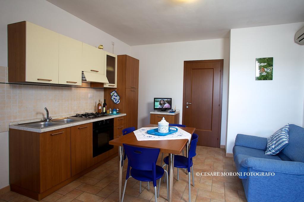 Residence Ai Campi Da Golf Saturnia Bilik gambar